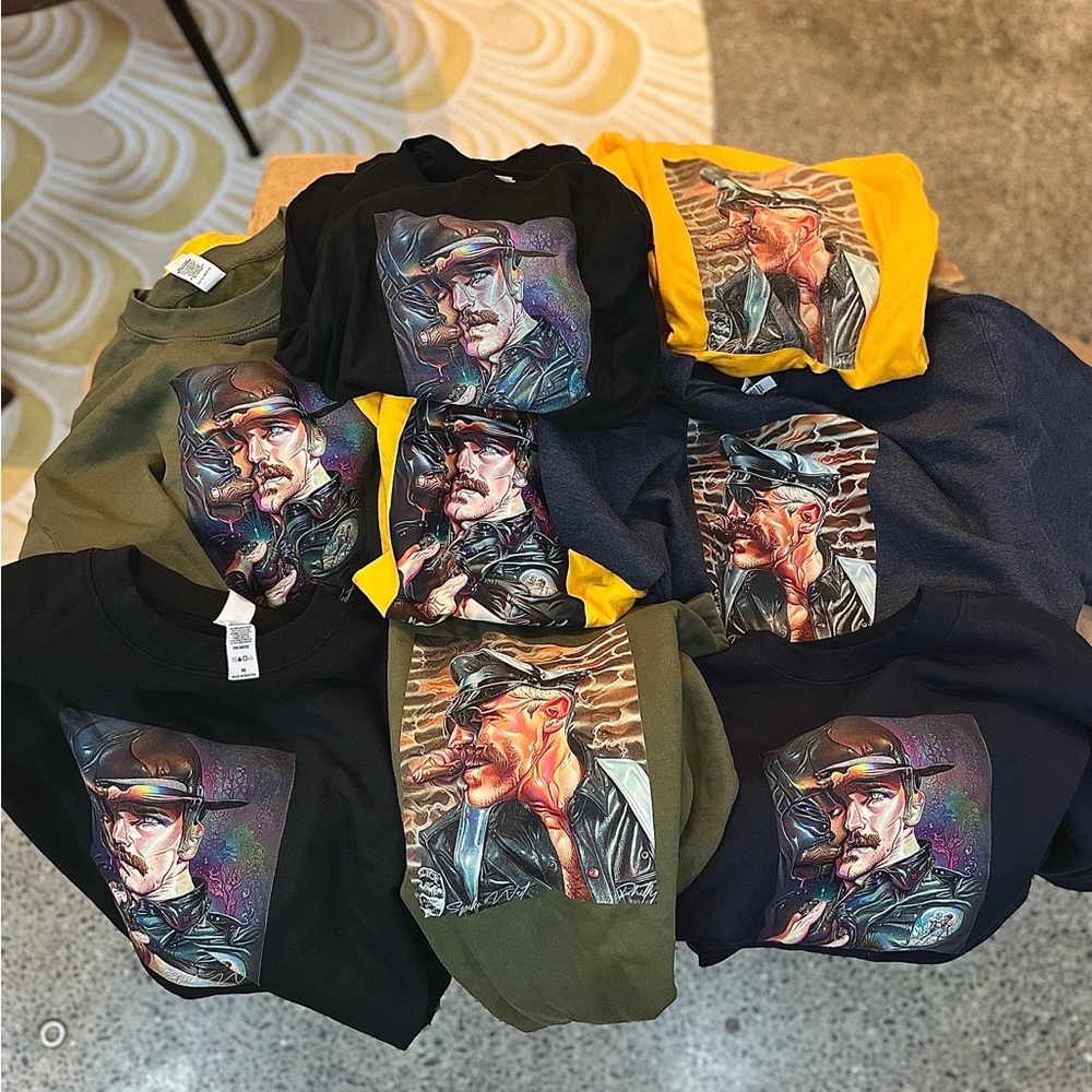 Medium and large T shirts and crew sweatshirts leather fetish apparel.